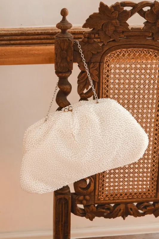 Glowing Glamour White Pearl Oversized Clutch sold by Lulus