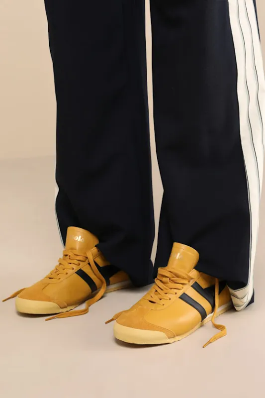 Race Sun and Black Leather Lace-Up Sneakers sold by Lulus