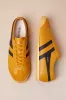 Race Sun and Black Leather Lace-Up Sneakers sold by Lulus
