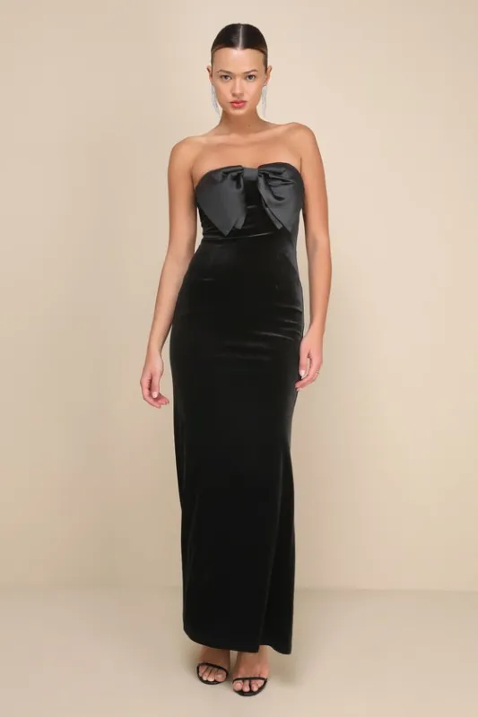Dramatic Stunner Black Velvet Bow Strapless Maxi Dress sold by Lulus