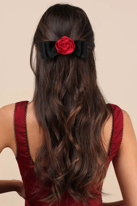 Ideally Dainty Black and Red Rosette Bow Hair Clip sold by Lulus