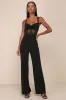 Adore the Feeling Black Sheer Lace Bustier Twist-Front Jumpsuit sold by Lulus