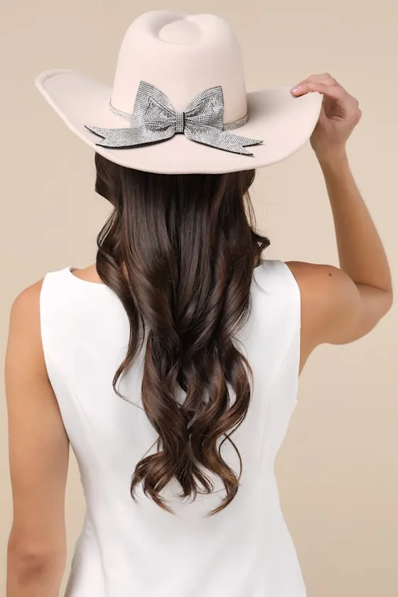 Glittering Cowgirl Bone Rhinestone Bow Western Hat sold by Lulus