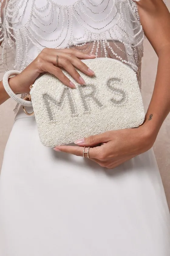 Mrs Moment Ivory Beaded Pearl Wristlet Bag sold by Lulus