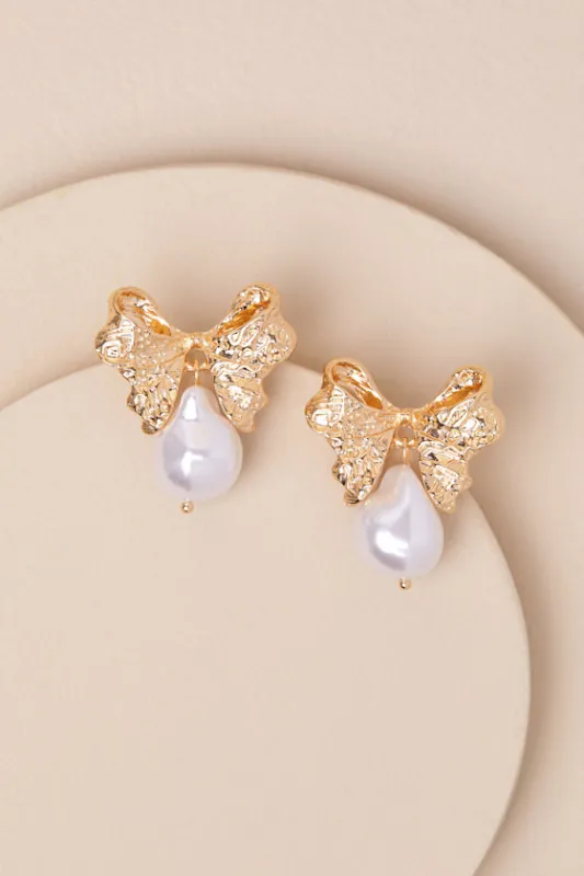 Sweetest Selection Gold Bow Pearl Earrings sold by Lulus
