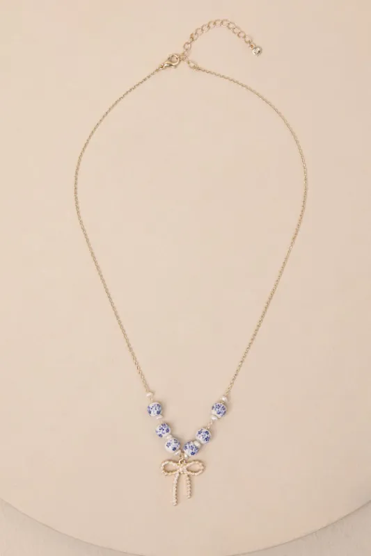 Darling Always Gold Beaded Bow Charm Necklace sold by Lulus