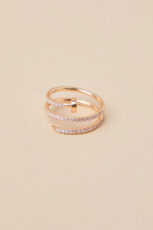 Glittering Twist Gold Rhinestone Nail Ring sold by Lulus