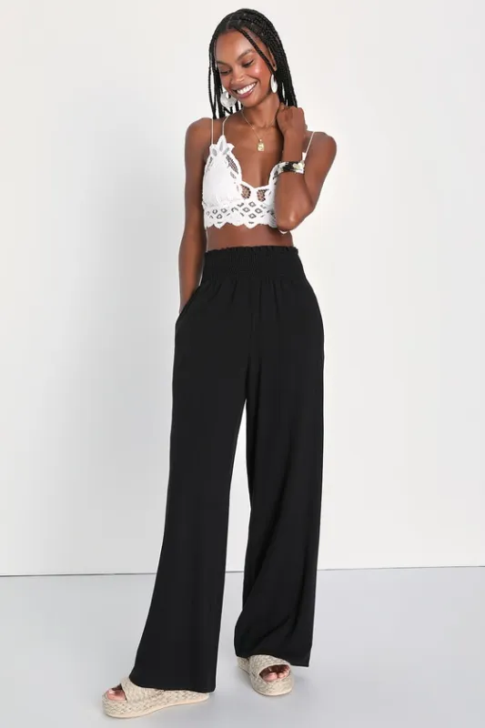 Hit the Breeze Black Smocked Wide-Leg Pants made by Lulus