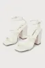 Mabie White Ankle Strap High Heel Sandals sold by Lulus