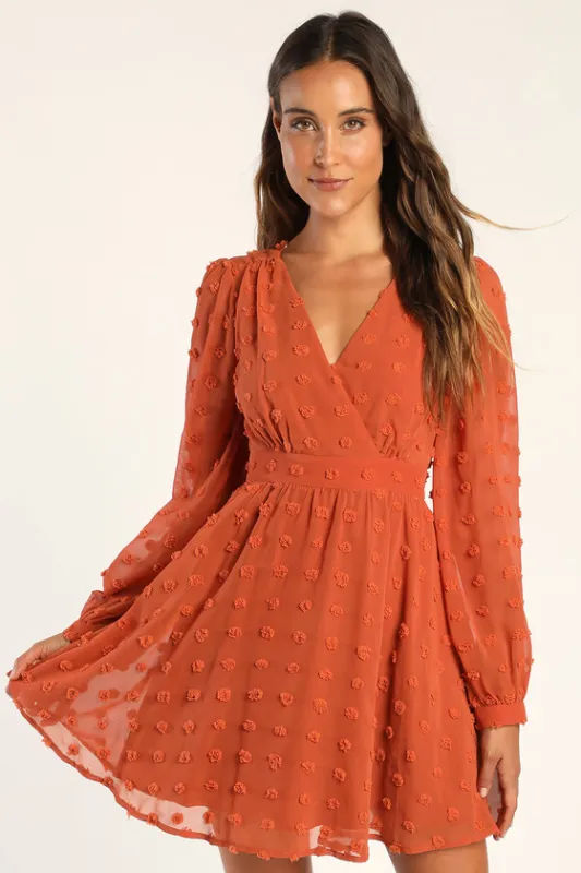 Always on Repeat Rust Orange Clip Dot Long Sleeve Mini Dress made by Lulus
