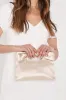 Total Romantic Champagne Satin Bow Clutch sold by Lulus