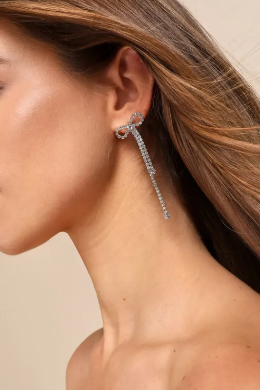 Pristine Pick Silver Rhinestone Bow Drop Earrings sold by Lulus