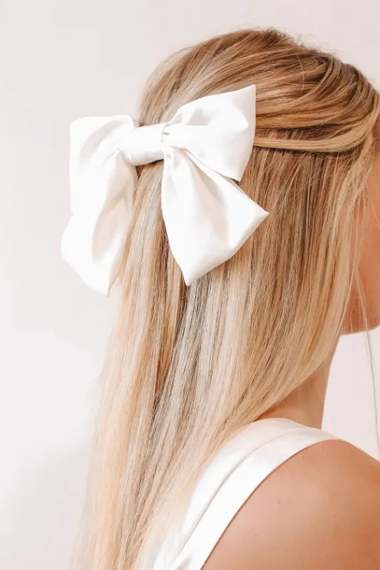 Final Touch White Satin Oversized Bow Hair Clip sold by Lulus