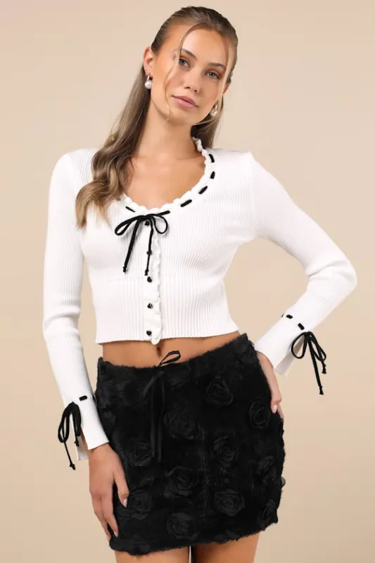 Extraordinarily Flirty Black Fuzzy 3D Rosette Micro Mini Skirt sold by Lulus