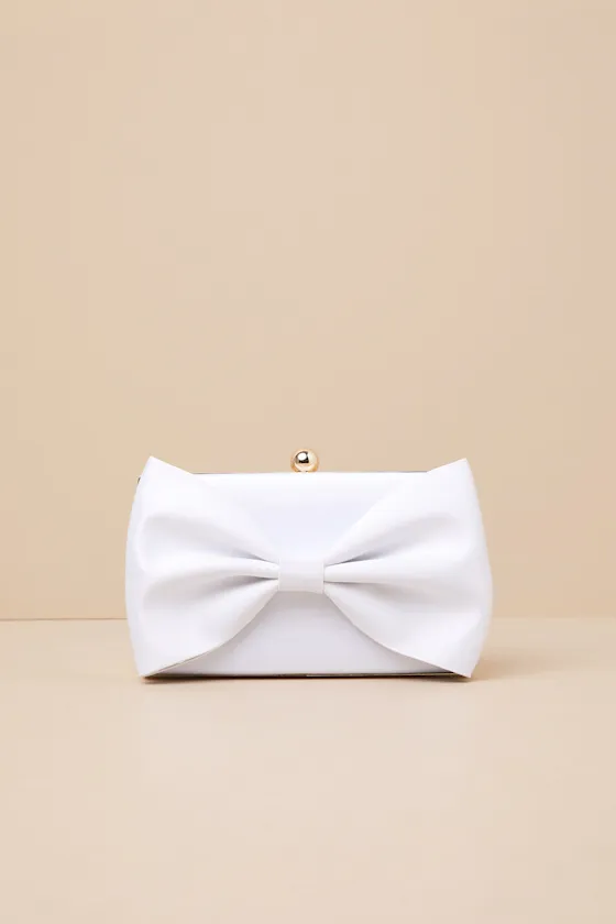 Karol White Bow Clutch sold by Lulus