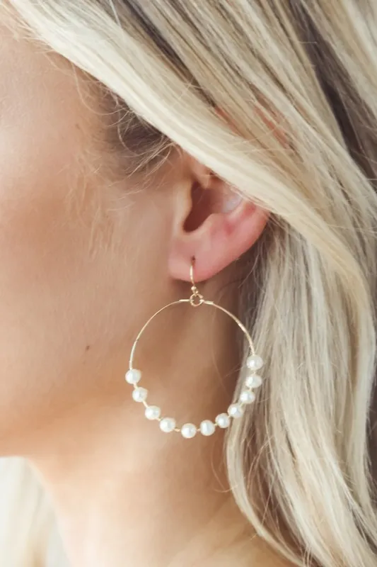 Take Me to the Beach Gold and Pearl Hoop Earrings sold by Lulus