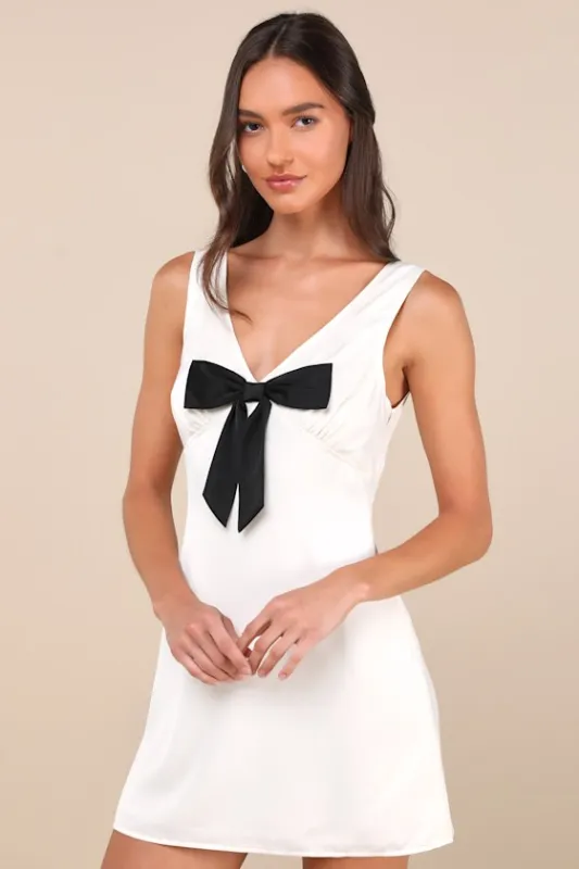 Faradiba Ivory Satin Sleeveless Bow Mini Dress sold by Lulus