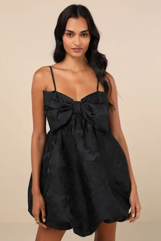 Coquettish Charm Black Bubble-Hem Bow Mini Dress With Pockets sold by Lulus