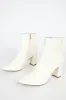 Sarai Off White Pointed-Toe Ankle Booties sold by Lulus