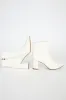 Sarai Off White Pointed-Toe Ankle Booties sold by Lulus