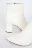 Sarai Off White Pointed-Toe Ankle Booties sold by Lulus