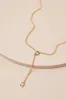 Notorious Brilliance Gold Rhinestone Lariat Necklace sold by Lulus