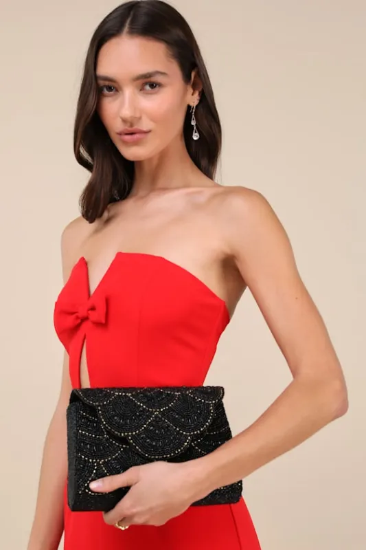 Rasima Black and Gold Beaded Scalloped Clutch sold by Lulus