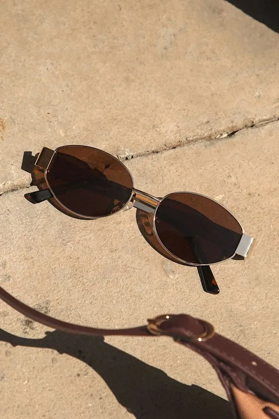 Trendsetting Take Gold and Brown Oval Sunglasses sold by Lulus