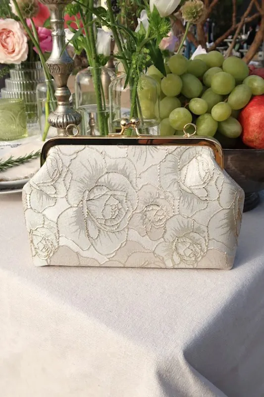 Posh Styling Ivory and Gold Satin Floral Lurex Clutch sold by Lulus