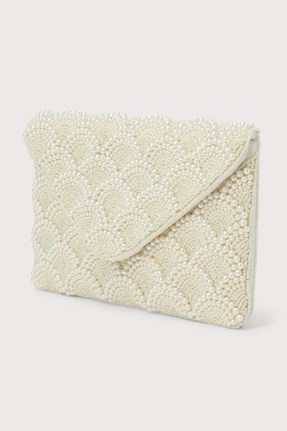 Glowing Aura Ivory Pearl Beaded Clutch sold by Lulus