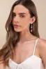 Endlessly Lovable Gold and White Pearl Heart Drop Earrings sold by Lulus