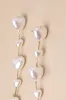 Endlessly Lovable Gold and White Pearl Heart Drop Earrings sold by Lulus