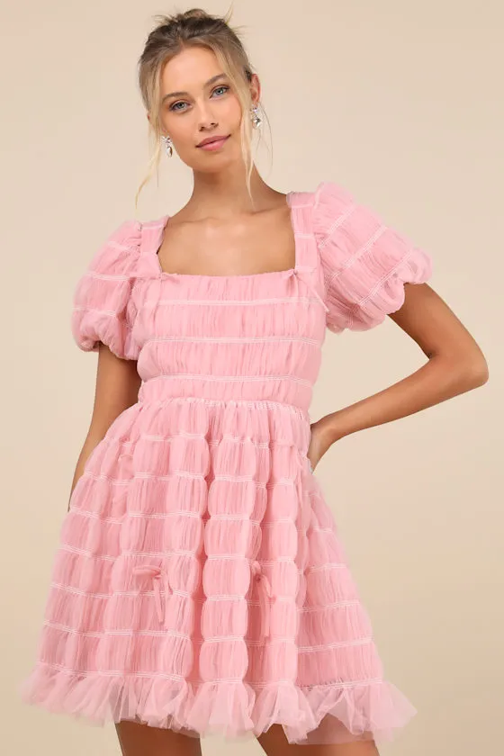 Utterly Adored Pink Tulle Textured Puff Sleeve Bow Mini Dress sold by Lulus
