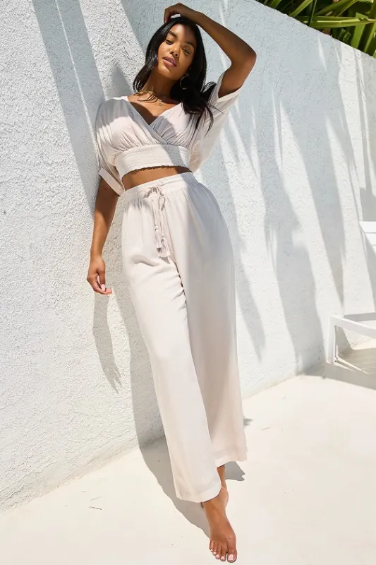 A Perfect Vacation Beige Two-Piece Swim Cover-Up Jumpsuit sold by Lulus