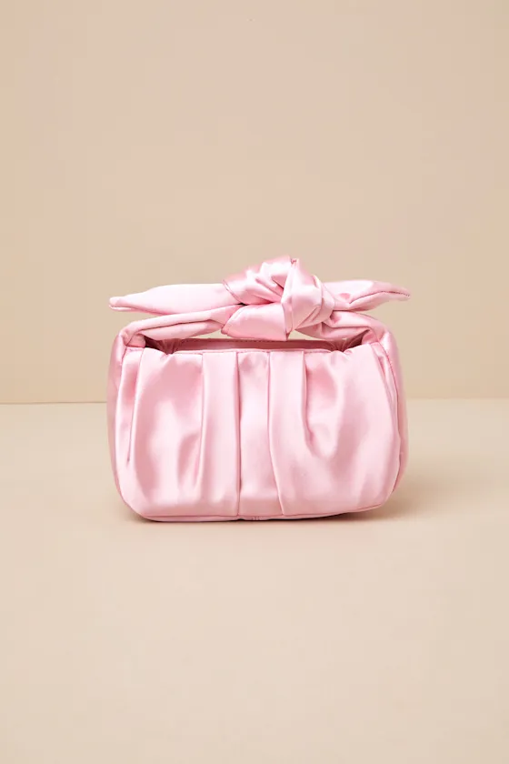 Essential Style Pink Satin Knot Handle Clutch Bag sold by Lulus