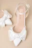 Suttonn Ivory Satin Bow Ankle Strap Pointed-Toe Pumps sold by Lulus