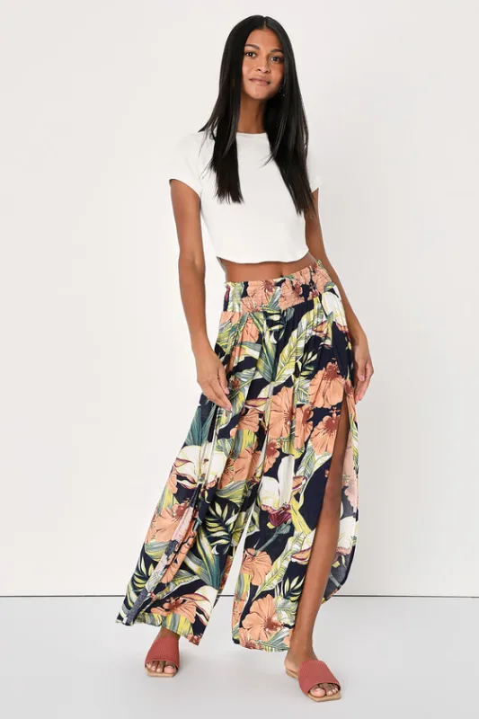 Island Inclination Navy Blue Tropical Print Flyaway Pants sold by Lulus