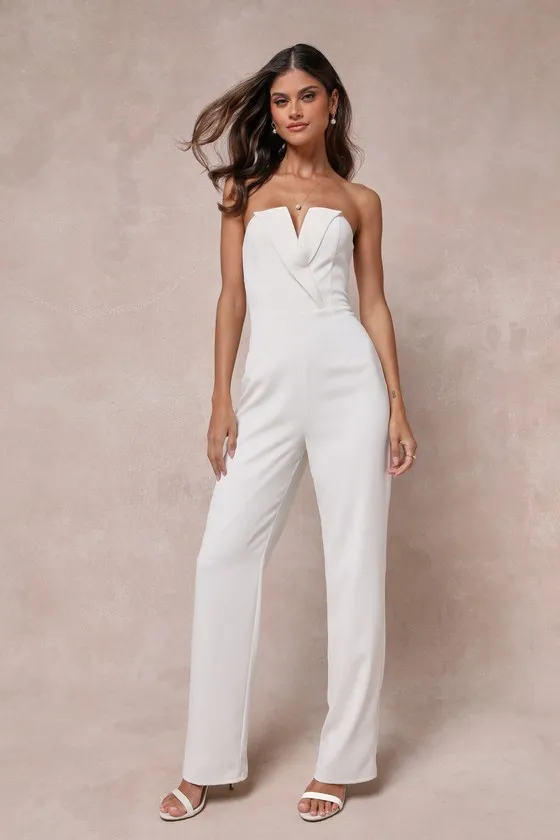 Striking Attitude White Strapless Surplice Jumpsuit sold by Lulus