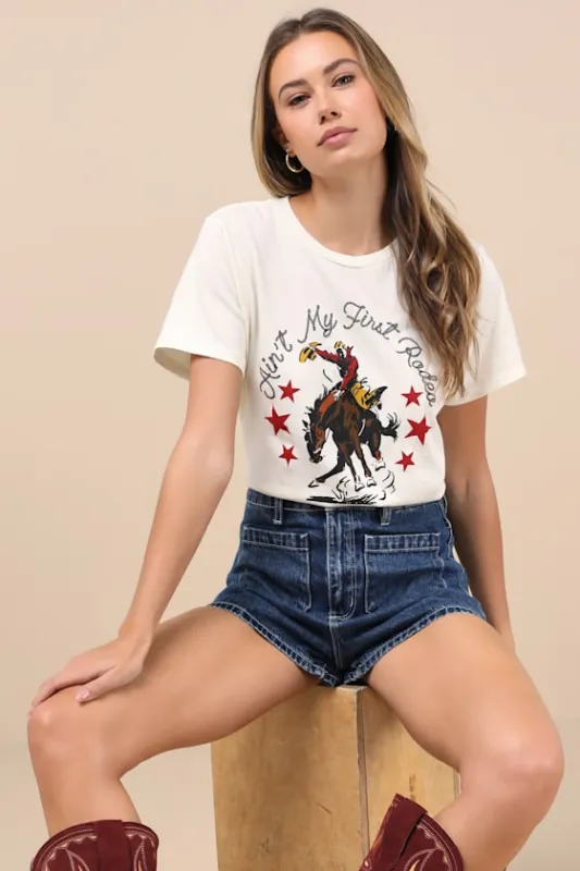 Ain't My First Rodeo Ivory Short Sleeve Graphic Tee sold by Lulus