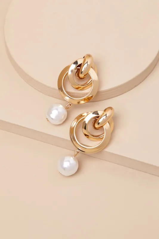 Gleaming Sensation Gold Pearl Doorknocker Earrings sold by Lulus
