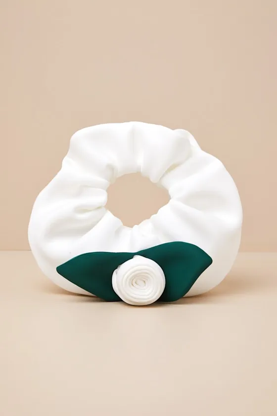 Fondant Ivory Scrunched Rosette Bag sold by Lulus