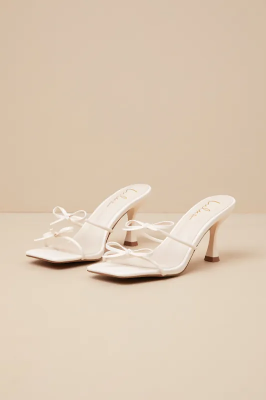 Serinda White Strappy Bow High Heel Slide Sandals sold by Lulus