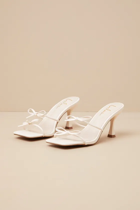 Serinda White Strappy Bow High Heel Slide Sandals sold by Lulus
