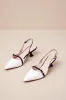 Hughette White & Black Color Block Pointed-Toe Slingback Pumps sold by Lulus