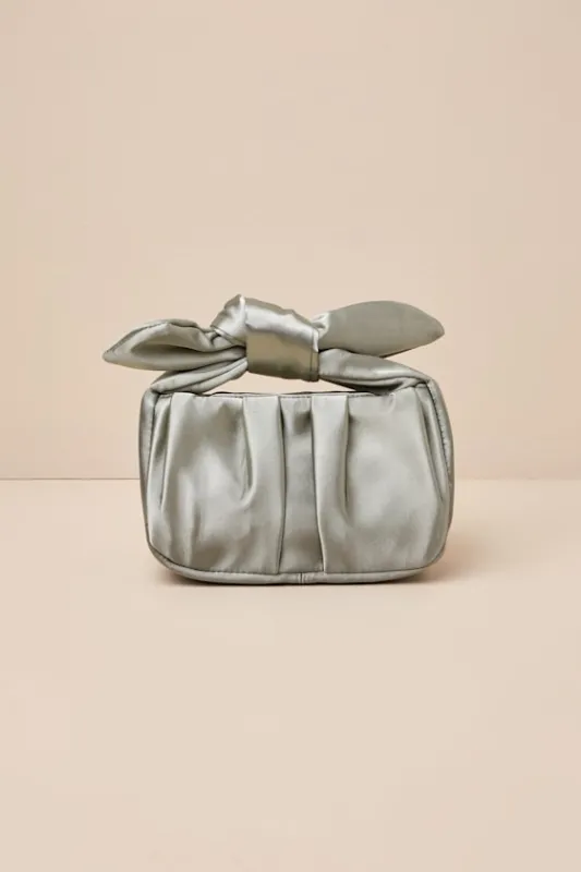 Essential Style Sage Green Satin Knot Handle Clutch Bag sold by Lulus