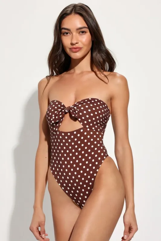 Devon Brown Polka Dot Strapless Knotted One-Piece Swimsuit sold by Lulus