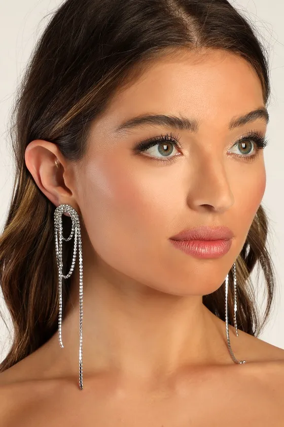 Dazzling Delights Silver Rhinestone Fringe Earrings sold by Lulus