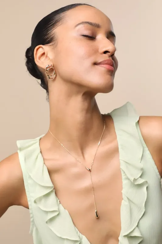 Posh Display Gold Lariat Necklace sold by Lulus