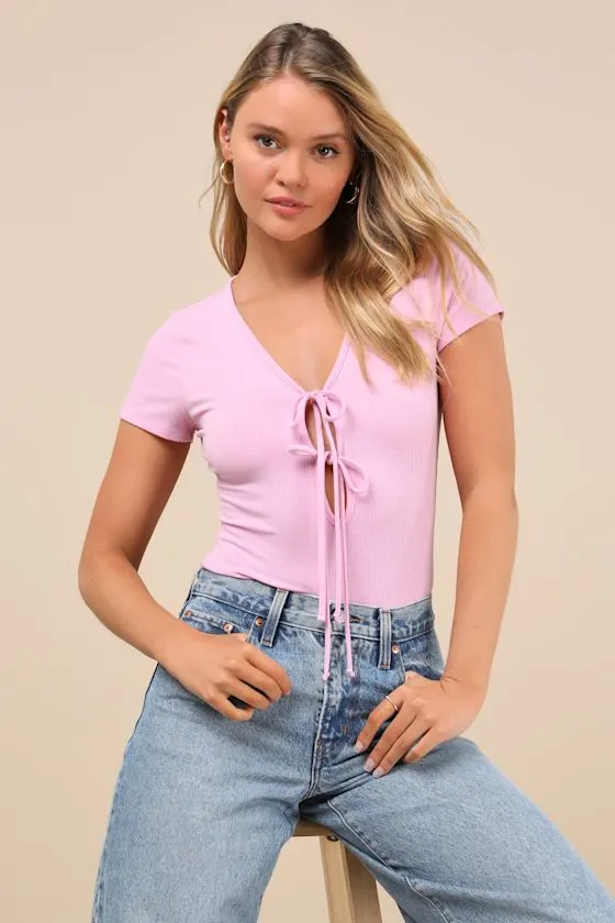 Lovely Ties Pink Ribbed Knit Tie-Front Short Sleeve Bodysuit sold by Lulus