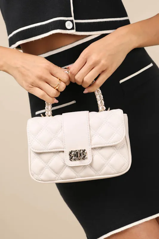 Posh Competence Ivory Quilted Chain Handle Bag made by Lulus
